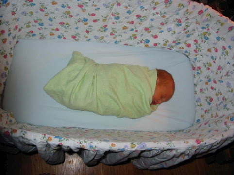 Jane asleep in the crib